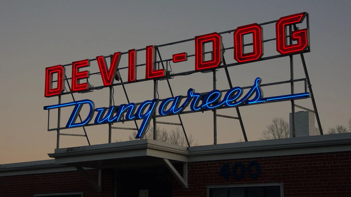 Men wearing Devil Dog athletic fit stretch jeans designed for comfort, mobility, and everyday blue collar wear