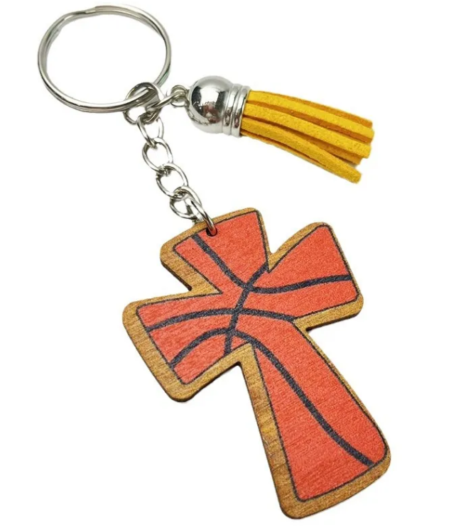 Orange wooden cross keychain with black basketball lines and yellow tassel