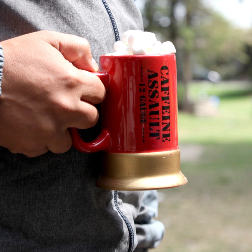 Caffeine Assault 12 gauge–style ceramic coffee mug designed for first responders and coffee lovers