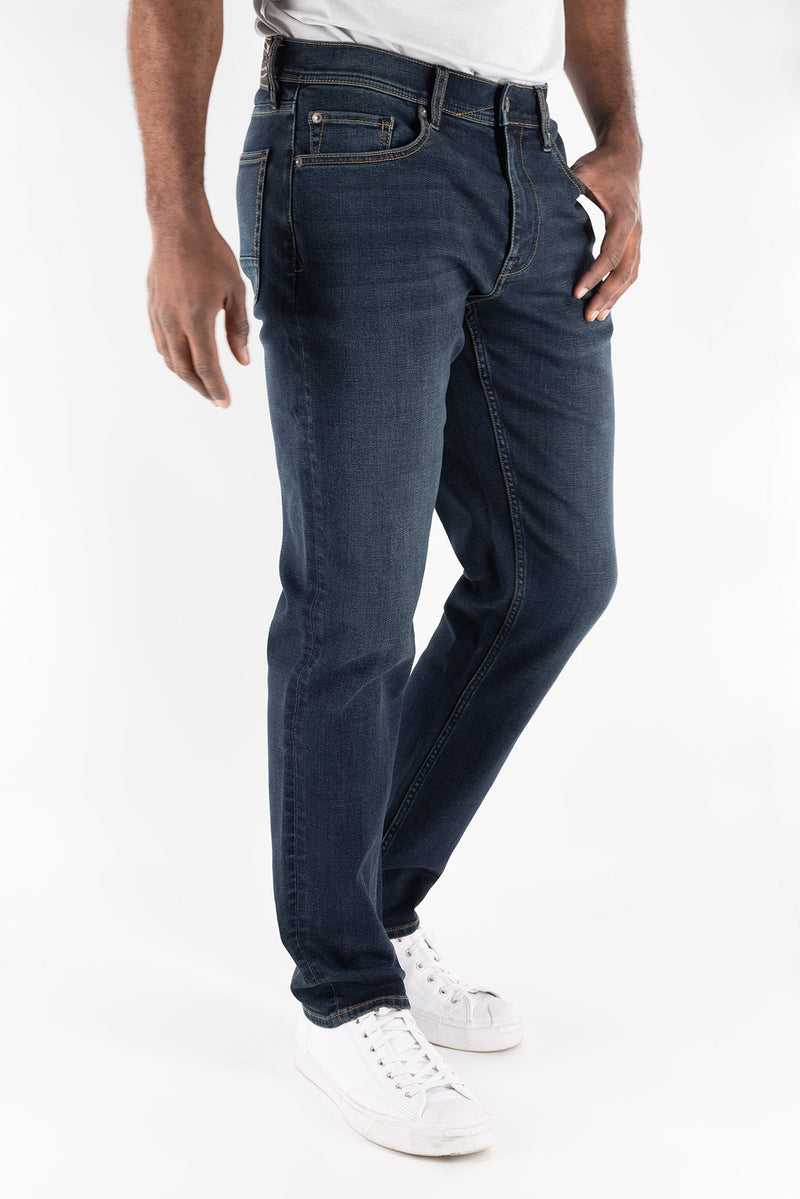 Men’s DEVIL-DOG Durham Dark Indigo athletic fit stretch denim jeans with roomier thigh fit and modern tapered leg styling