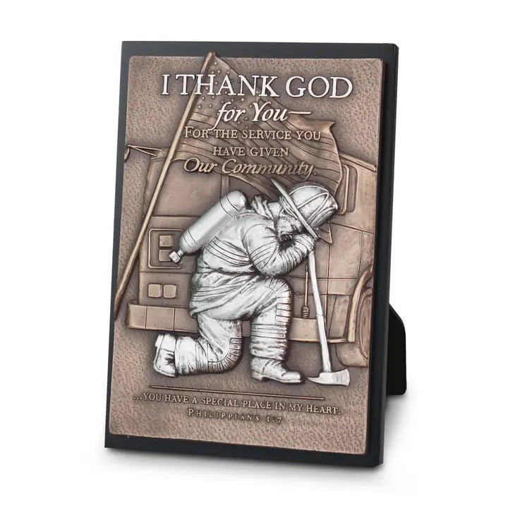 Firefighter gratitude plaque with kneeling firefighter, American flag, and faith message.