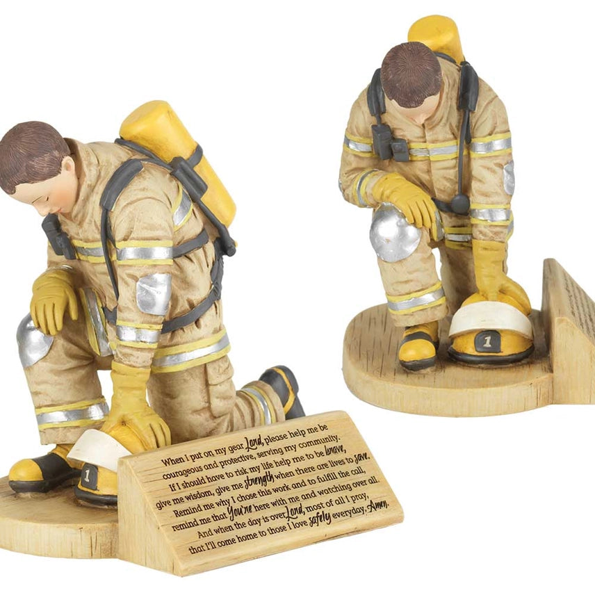 Firefighter’s Prayer statue by Grace showing a kneeling firefighter in prayer.