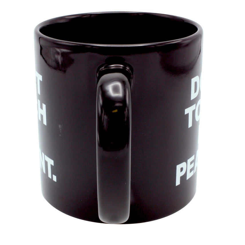Side profile of the oversized 22 oz "Don't Touch Me Peasant" black ceramic coffee mug with a large comfortable handle and humorous sarcastic design for the office or home.