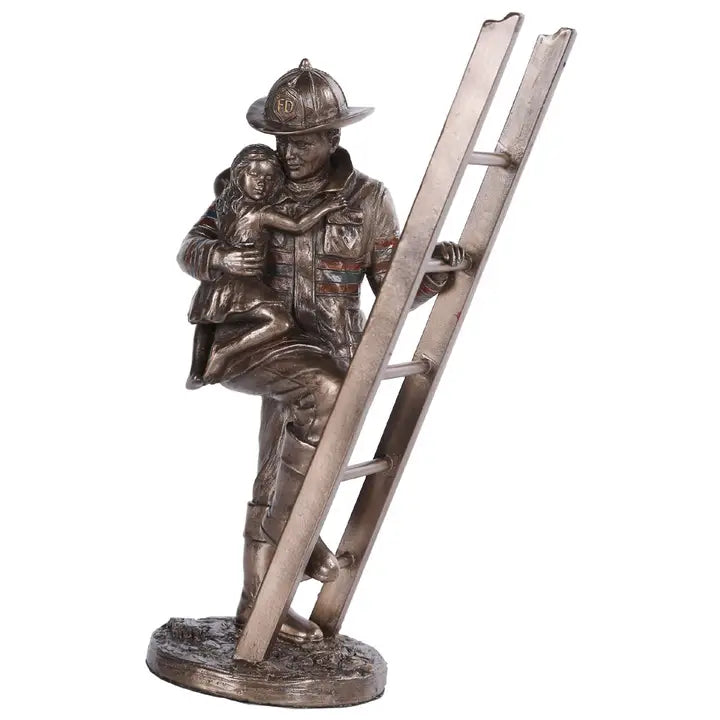 Ladder rescue firefighter statue depicting a fireman carrying a rescued child down a ladder.