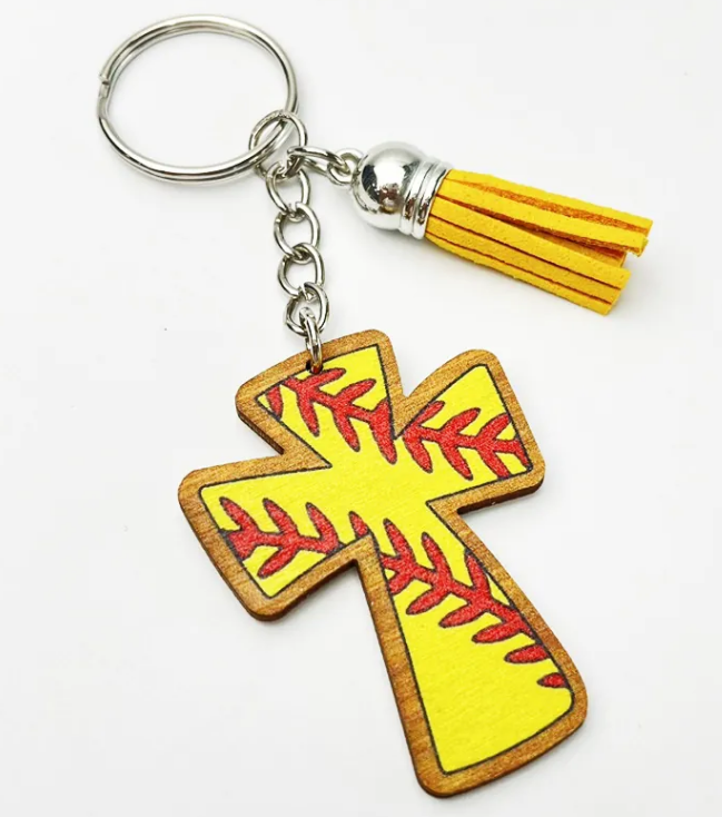 Yellow wooden cross keychain with red softball seams and yellow tassel