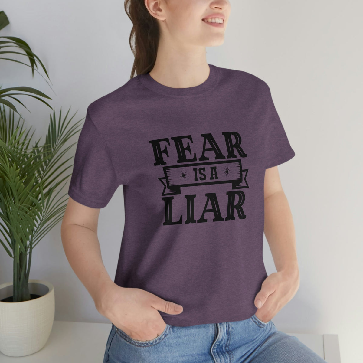 Fear is a liar Women's Short Sleeve Tee Heather Team Purple